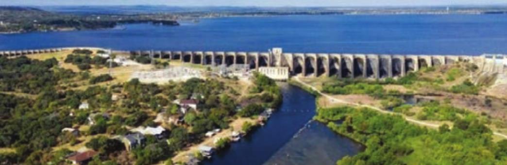 Aerial image of Lake Buchanan and Buchanan Dam near capacity pool level. Legacy of the Lower Colorado River Authority.